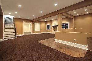 Empty living room with brown carpet