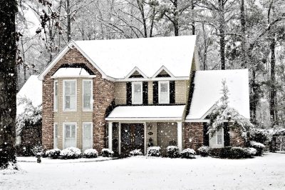 Exterior of a home with snowfall