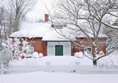 Front exterior of a home with snow