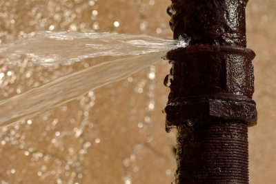 Plumber Repairing a Broken Pipe in Maryland