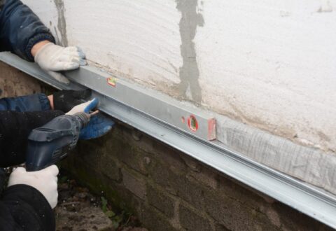 Warning signs of foundation repair needs, such as wall cracks and settling floors in Maryland
