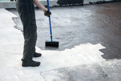 Applying a Waterproof Coating to a Basement Floor in Maryland