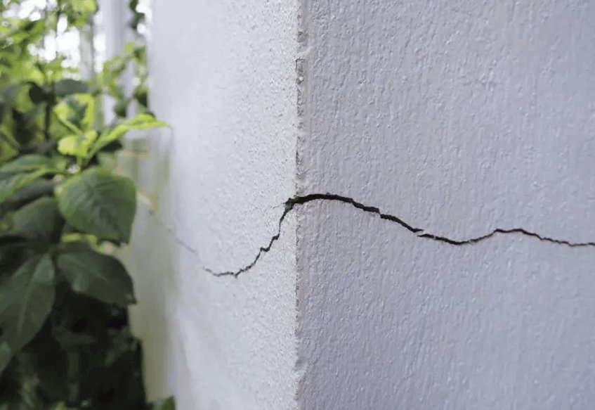 Detailed view of a wall crack requiring basement repair in Maryland