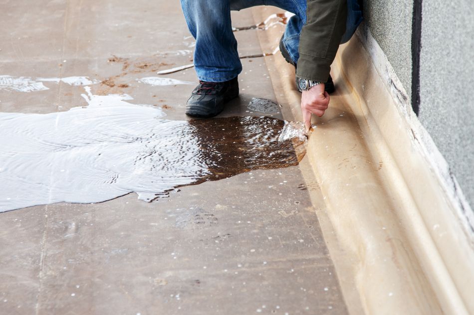 Water leaking into basement floor from foundation crack causing pooling issue
